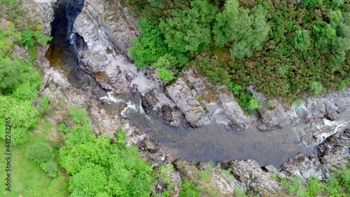 Wallpaper Mural Top down drone video of a river flowing through a tree lined gorge with waterfalls Torontodigital.ca