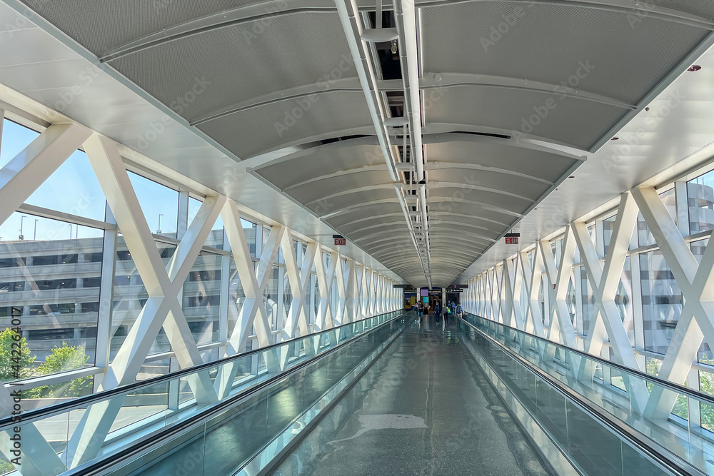 Walking bridge between terminals at Boston Logan International Airport in USA. Walking bridge between terminals at Boston Logan International Airport in USA.