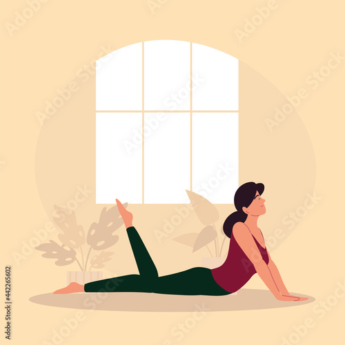 woman in yoga pose at home