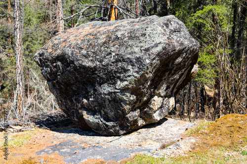 huge stone boulder out of the blue