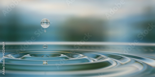 Water drop splash close-up on water surface 3d illustration