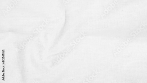 Organic Fabric cotton backdrop White linen canvas crumpled natural cotton fabric Natural handmade linen top view background  organic Eco textiles White Fabric linen texture