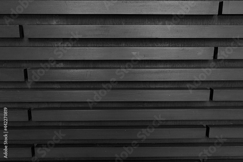 Closeup wall made of black wooden texture background