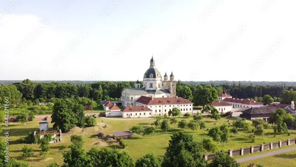 Pazaislis monastery complex building with majestic dome in ascending drone view Pazaislis monastery complex building with majestic dome in ascending drone view