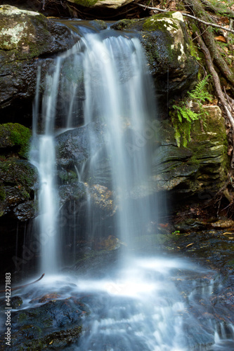 Silky water of Day Pond Falls in Colchester  Connecticut.