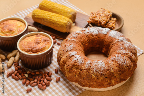 Traditional food for Festa Junina (June Festival) on color background