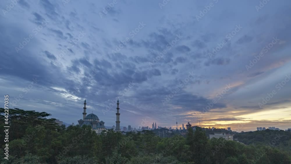 timelapse : majestic view of a beautiful mosque during sunrise timelapse : majestic view of a beautiful mosque during sunrise