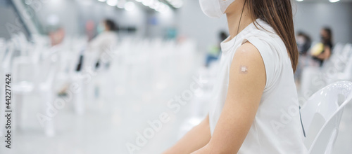 Happy Woman showing her arm with bandage after receiving vaccine. Vaccination, immunization, inoculation and Coronavirus ( Covid-19 ) pandemic Free Download Happy Woman showing her arm with bandage after receiving vaccine. Vaccination, immunization, inoculation and Coronavirus ( Covid-19 ) pandemic - GFXLoad