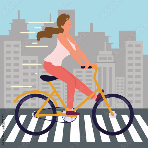 girl with bicycle on crosswalk photo