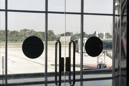 Pekanbaru, Indonesia - Jun 20, 2021 : a proboscis to the plane that hangs from behind the door