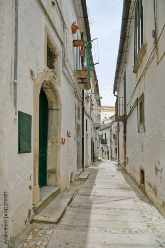 Bovino, Italy, June 23, 2021. A narrow street among the old houses of a medieval village in southern Italy. © Giambattista