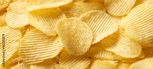 crispy golden potato chips snack texture background