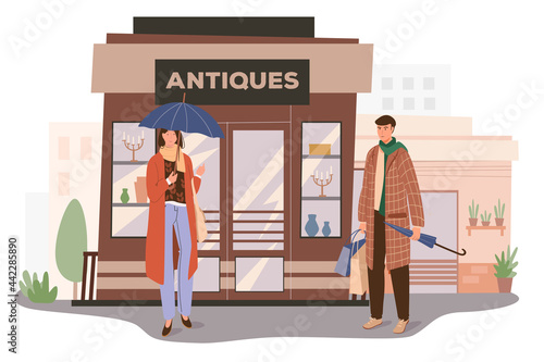 Antiques store building web concept. Man and woman standing at entrance to shop with vintage goods. Customers shopping. People scenes template. Vector illustration of characters in flat design