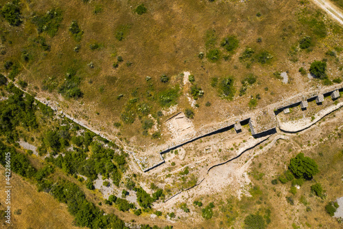 Aerial view of ancient Asseria ruins in Dalmatian Zagora in Croatia photo