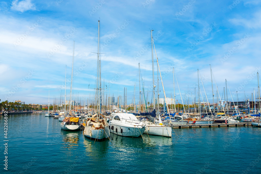 The port of the city of Barcelona with many sailing ships. Europe's main port on the Mediterranean The port of the city of Barcelona with many sailing ships. Europe's main port on the Mediterranean