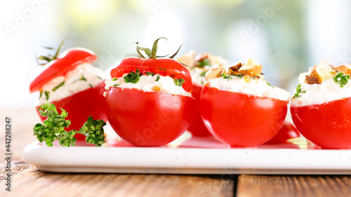 cherry tomato stuffed with cheese and herbs