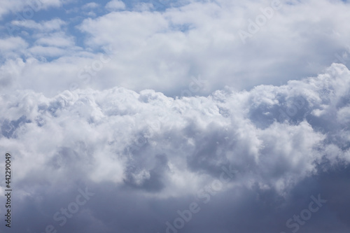 Fototapeta Naklejka Na Ścianę i Meble -  Cumulus clouds in the summer sky.