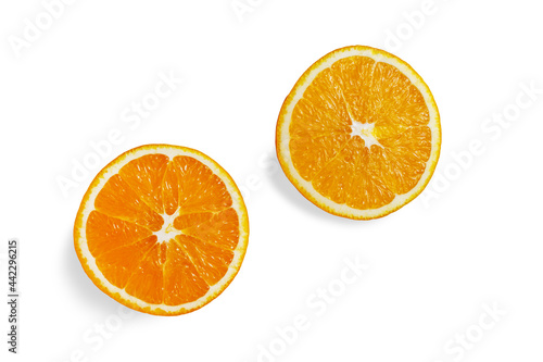two slices of orange on a white isolated background. sliced orange