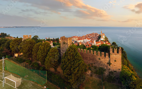 Panoramic photo about piran's old town in Slovenia Amazing morning lights in this peninsula with the Zvonik Campanile Bell Tower what is the landmark this town. photo