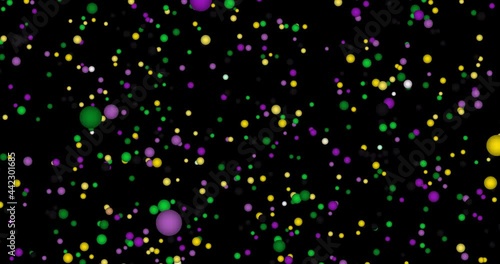 Mardi Gras bright colorful falling confetti. Animation colorful flying yellow, green, purple beads on black background. Mardi Gras Party. Venetian carnival mardi gras party. 4k video graphic animation photo