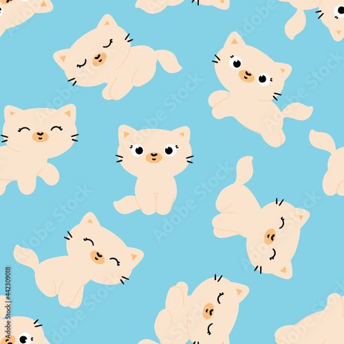 Seamless pattern with cute cartoon cats on a blue background