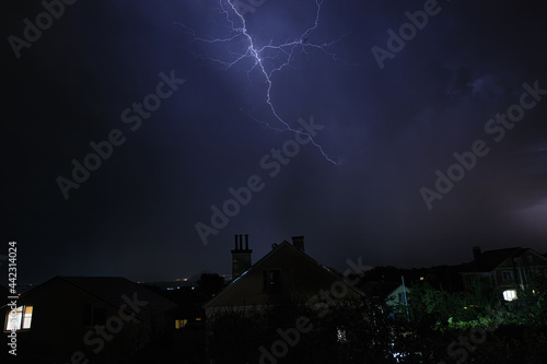 Beautiful lightning flashes in the evening sky during a thunderstorm