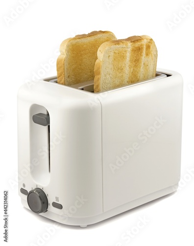 Two slices of golden brown toast in an electrical toaster isolated on a white background