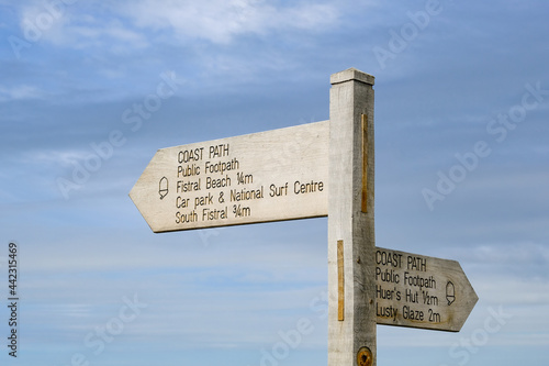 Signpost along the coastal path at Newquay, Cornwall, UK. 