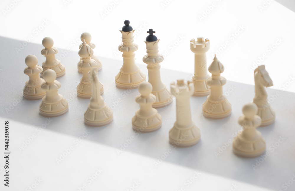 chess, white pieces on a light table surface, indoors. Intellectual games for children and adults, logic, thinking, chess on the table chess, white pieces on a light table surface, indoors. Intellectual games for children and adults, logic, thinking, chess on the table