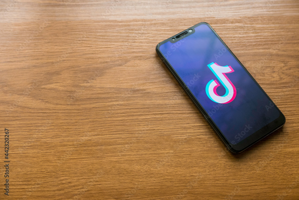 KEDAH,MALAYSIA - CIRCA JUNE,2021 : Mobile phone with Tik Tok logo on