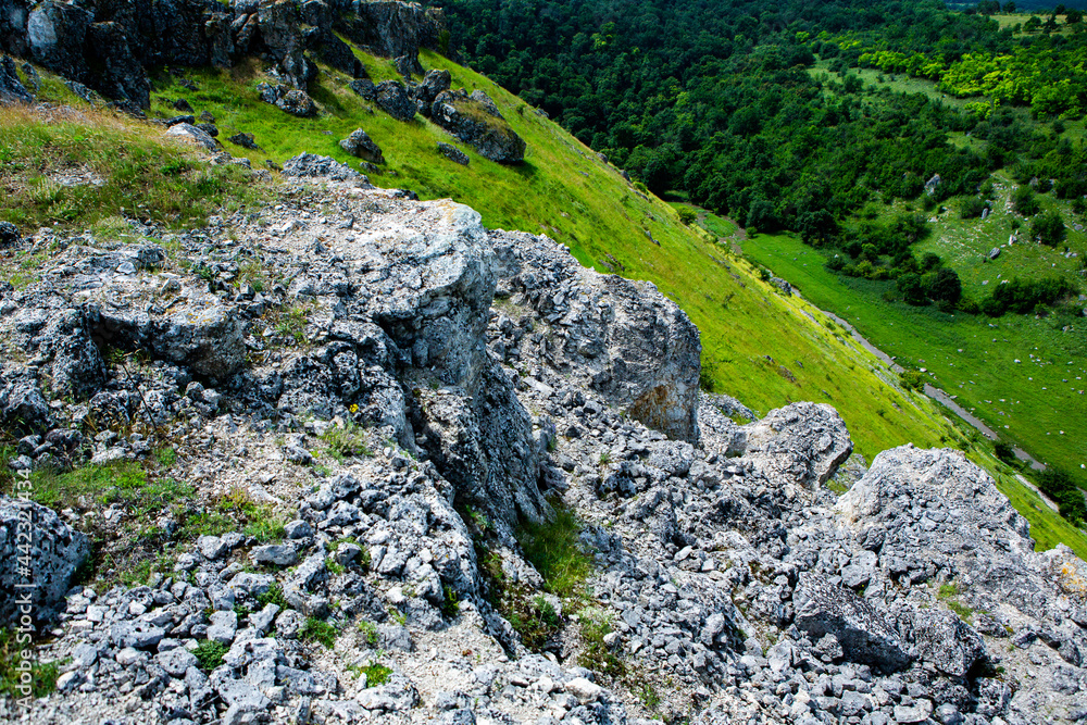 Beautiful green landscapes with hills, forest and rocks in Moldova. Eco tourism without people.