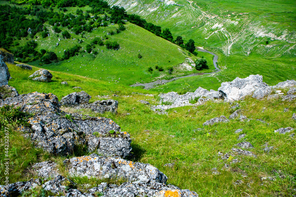 Beautiful green landscapes with hills, forest and rocks in Moldova. Eco tourism without people. Beautiful green landscapes with hills, forest and rocks in Moldova. Eco tourism without people.