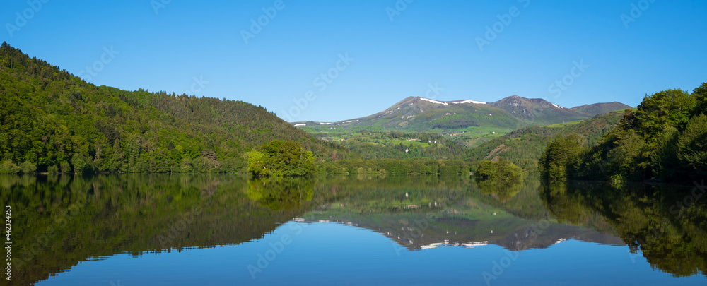 Chambon lake in Auvergne Volcanic Regional Nature Park. Morning. Puy-de-Dome, Auvergne, France. Beautiful nature background