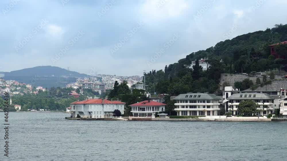 Shore of bosphorus strait full of residential houses which local people use as weekend residences Shore of bosphorus strait full of residential houses which local people use as weekend residences