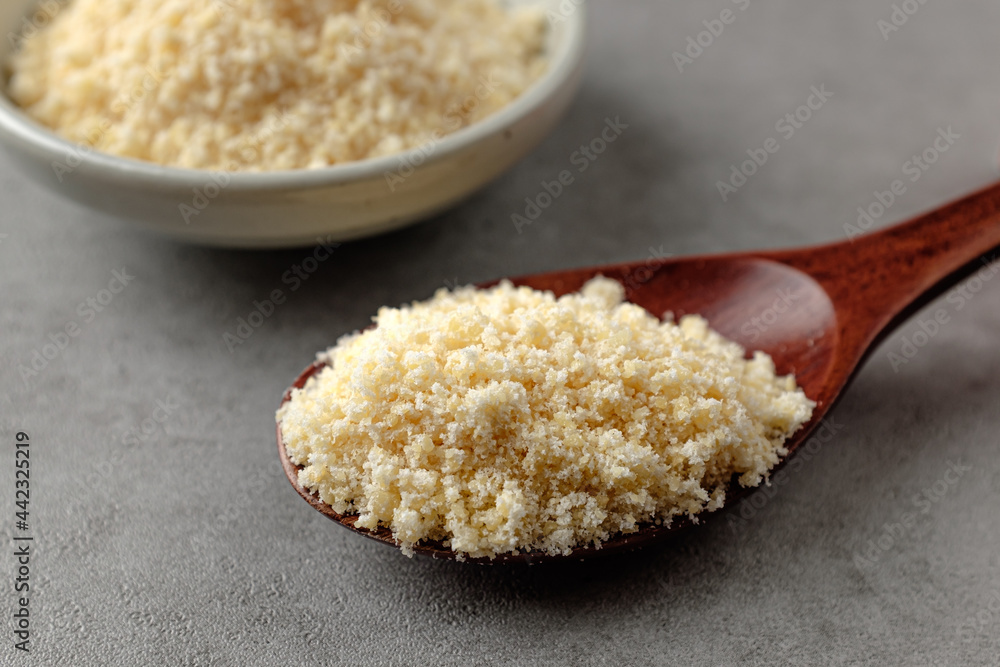 Finely ground savory and salty Parmesan cheese powder Finely ground savory and salty Parmesan cheese powder