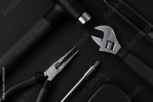 Black tools on black background