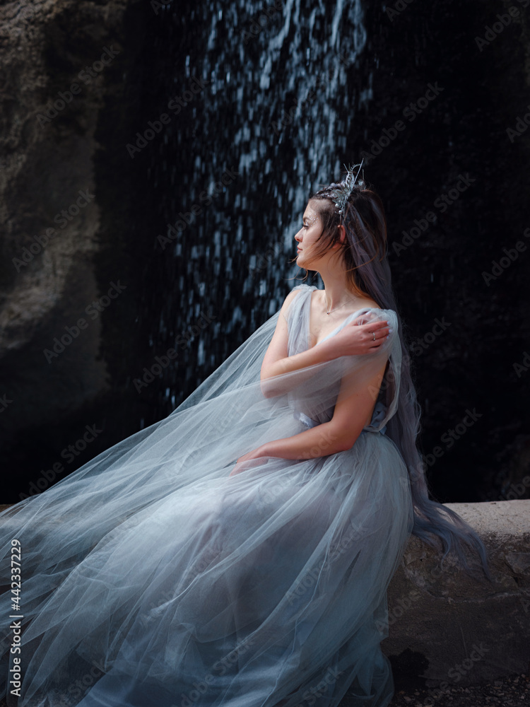 a beautiful woman like a fairy or nymph walking in the park a beautiful woman like a fairy or nymph walking in the park