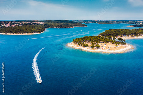 Speed boat in Istria, Croatia island Adriatic Sea blue water 