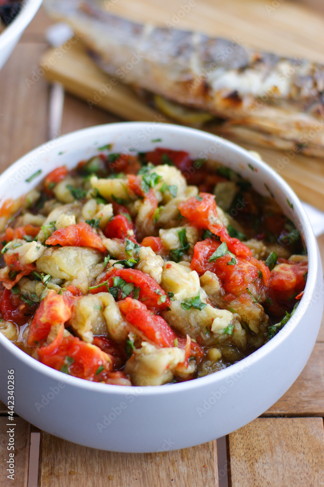 Spicy salad with eggplant and grilled tomatoes. Spicy salad with eggplant and grilled tomatoes.