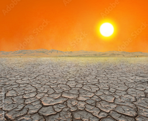dry cracked dirt in desert landscape, drought in nature