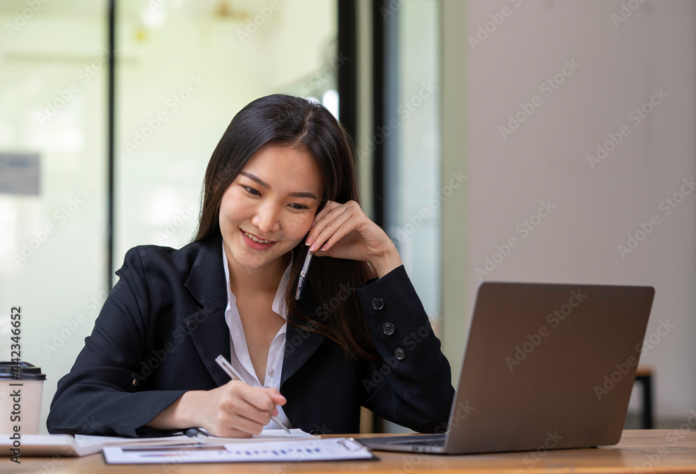 Accountant woman happy working in new office, business woman talking on the phone to agree a business deal. Accountant woman happy working in new office, business woman talking on the phone to agree a business deal.