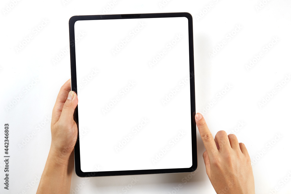 Hand holding a mockup tablet with blank screen isolated on white Hand holding a mockup tablet with blank screen isolated on white
