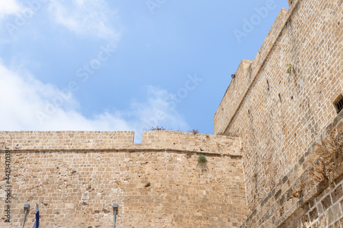 The fortress  walls of the Crusader fortress of the old city of Acre in northern Israel