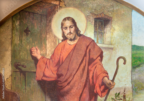 VIENNA, AUSTIRA - JUNI 18, 2021: The symbolic fresco of Jesus knocking on you...