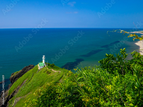 Lighthouse in a cape (Kakuda cape, Nishikan, Niigata, Japan)