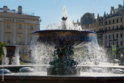 View of the fountains on the square in front of the Bolshoi Theatre (Big Theatre). Moscow architecture and landmark,Moscow daytime cityscape. Large old fountain on Teatralnaya Square 