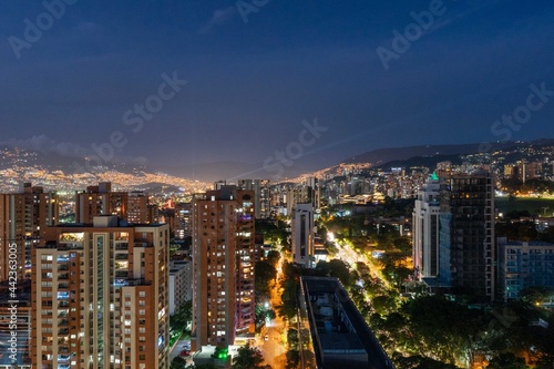 Medellin, Antioquia, Colombia. December 21, 2020: Night urban landscape with buildings in El Poblado.