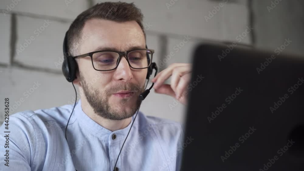 The worker of call center is in the performance of his duties The worker of call center is in the performance of his duties