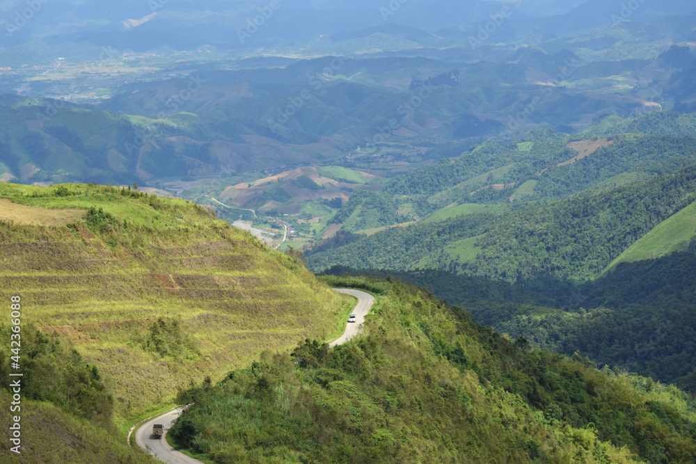 Curved asphalt road in high mountains of laos.