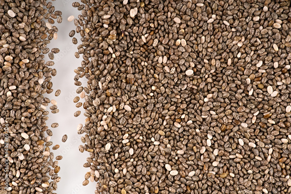 Chia seeds isolated with white background. Pile of healthy chia seeds background. Chia seeds isolated with white background. Pile of healthy chia seeds background.